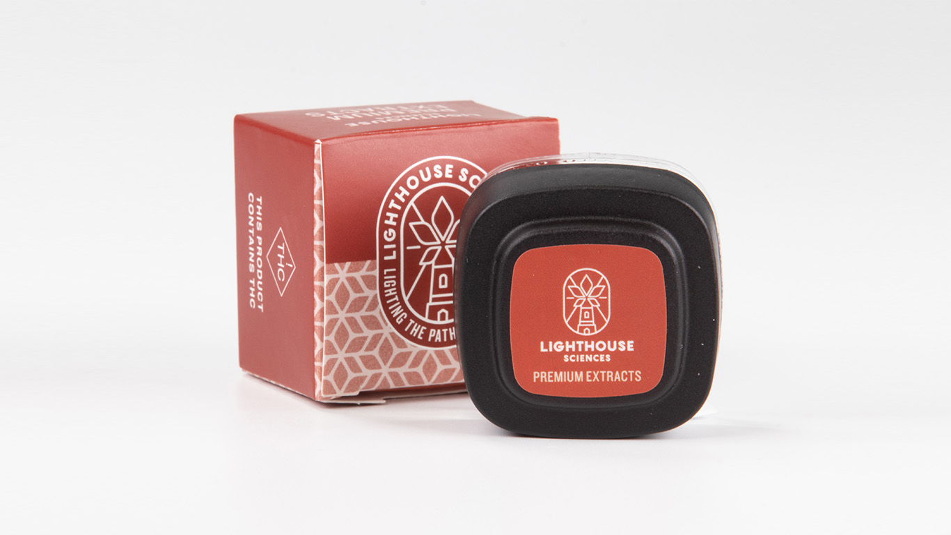 Lighthouse Sciences Premium Extracts jar in front of product package